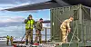 ALLIERTE: Amerikansk og norsk personell arbeider med å laste av gods fra en amerikansk Hercules C130 på Andøya i forbindelse med øvelsen Cold Response 2020.