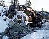 Her graves det grøfter til vannledninger i et nytt hytteområde på Turufjell, Sprenåsgrenda.