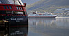 Både MS Roald Amundsen og MS Spitsbergen, her i Tromsø i august, er blant de ni skipene som nå vil stå i havn en periode. Kun to av Hurtigrutens skip vil gå langs kysten som normalt i tiden framover.