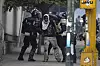 En demonstrant blir arrestert av politiet under gårsdagens protester mot president Nicolas Maduro i Venezuelas hovedstad, Caracas.