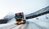 VITAL VEI: Trailere bringer råstoff inn til Furuflaten og kjører ferdig vare ut. Veiene er den viktigste ferdselsåren for industrien. Her fra fylkesvei 868.