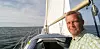 PARTILEDER: Hans Lysglimt Johansen fotografert i sin egen seilbåt.