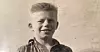 Kalle satt ikke stille i timene i klasserommet, og hadde ikke tenkt seg videre skolegang. En lærer ville det annerledes. Her er Kalle hentet inn fra et fotoalbum.
