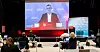 DIGITALT LANDSMØTE: HK-leder Christopher Beckham på storskjerm hos en gruppe representanter fra region Østlandet Sør samlet til landsmøte i Drammen.