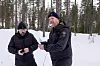 UTE PÅ POST: Ole Knut Steinset og Erik Ola Helstad kontrollerer avstanden fra der jegere sto til der ulven ble skutt.