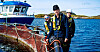 TOPP PÅ HAVET: Fra venstre Mathilde Chanel Sørø, Sølve Torsvik og Chayapol Pratumaruk - havbrukslærlinger i Salmar.