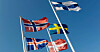 Bare ett land i verden har utelatt rødt hvitt eller blått. Her er de nordiske flaggene