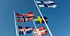 Bare ett land i verden har utelatt rødt hvitt eller blått. Her er de nordiske flaggene
