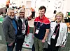 Svein Harald Larsen (NHO Elektro), Benedicte Sterner (LO), Harald Haugen (ekspert og elektriker) og Tude Tinnlund (LO) avlegger elektriker Thomas Christensen et besøk