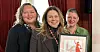 Prisvinner Christine Fredriksen sammen med sine kolleger i FO, Sherin Andreassen (t.v.) og Hanne Kro Sørborg.