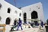Utenlandske arbeidere bygde operahuset i Muscat i Oman i 2010.