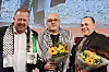SKJERF: Hilsningstale fra palestinsk fagbevegelse (PGFTU) V/Majdi Shella. Jan Olav Andersen fikk skjerf.