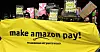 Ansatte Amazon krever bedre arbeidsvilkår og høyere lønn for å takle det økte prisnivået, skriver Bloomberg. (Arkivbilde fra demonstrasjon i Berlin i 2017).