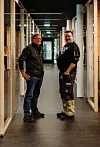 Fornøyde: Både John Arnt Holmen (til venstre) og Nils Ingvald Reitan er storfornøyde med det nye museumsbygget som ble åpnet i fjor, som har gjort arbeidsforholdene mye bedre.