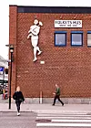 Arbeiderkunst. Da huset markerte 100 år, kom 'Arbeideren' av Jan Warholm opp på veggen.