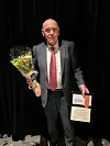 50-årsjubilanten: Anders Bidne fikk diplom og blomster for å ha vært medlem av forbundet i hele 50 år.