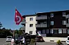 SELGES: Huset skal selges og fagbevegelsen er på flyttefot. Flagget følger med på flyttelasset.