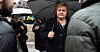 Erna Solberg på en regntung dag.