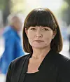 PROTESTERER: Sissel M. Skoghaug er nestleder i Fagforbundet og misliker at LO-logoen står sammen med våpenprodusenten Nammo på draktene til landslagshopperne.