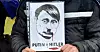 En plakat som viser Russlands president Vladimir Putin som Adolf Hitler under en demonstrasjon mot den russiske invasjonen av Ukraina i Podgorica, Montenegro. (Arkivbilde)